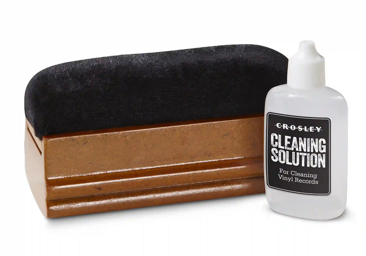 Crosley black record cleaning kit with detailed view of brush and cleaning components