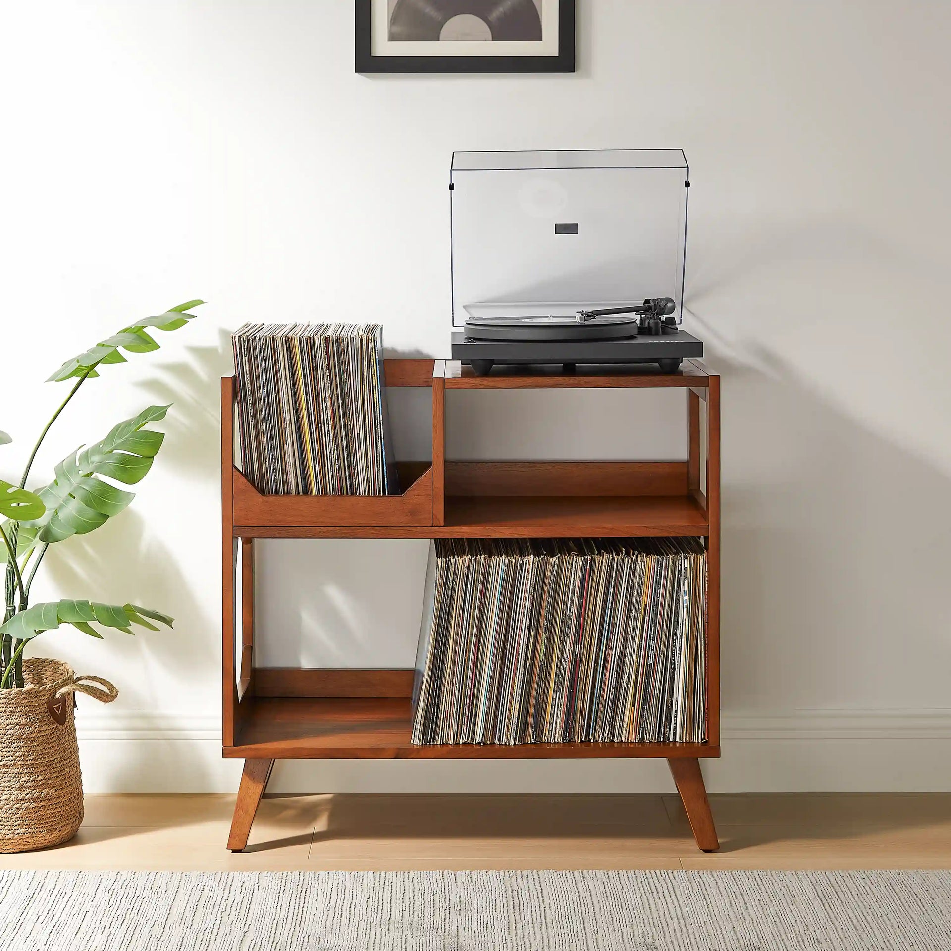 Crosley Asheville walnut record player stand with vinyl storage in living room setting
