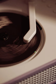 Crosley Cruiser CD Player in lavender, close-up detail view showing controls and design features