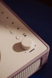 Crosley Cruiser CD Player in lavender, showing detailed view of controls and design elements