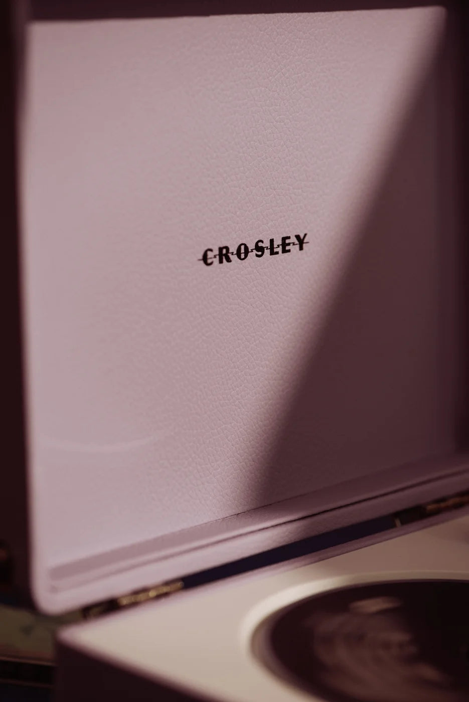Crosley Cruiser CD Player in lavender, detail view showing player controls and design elements