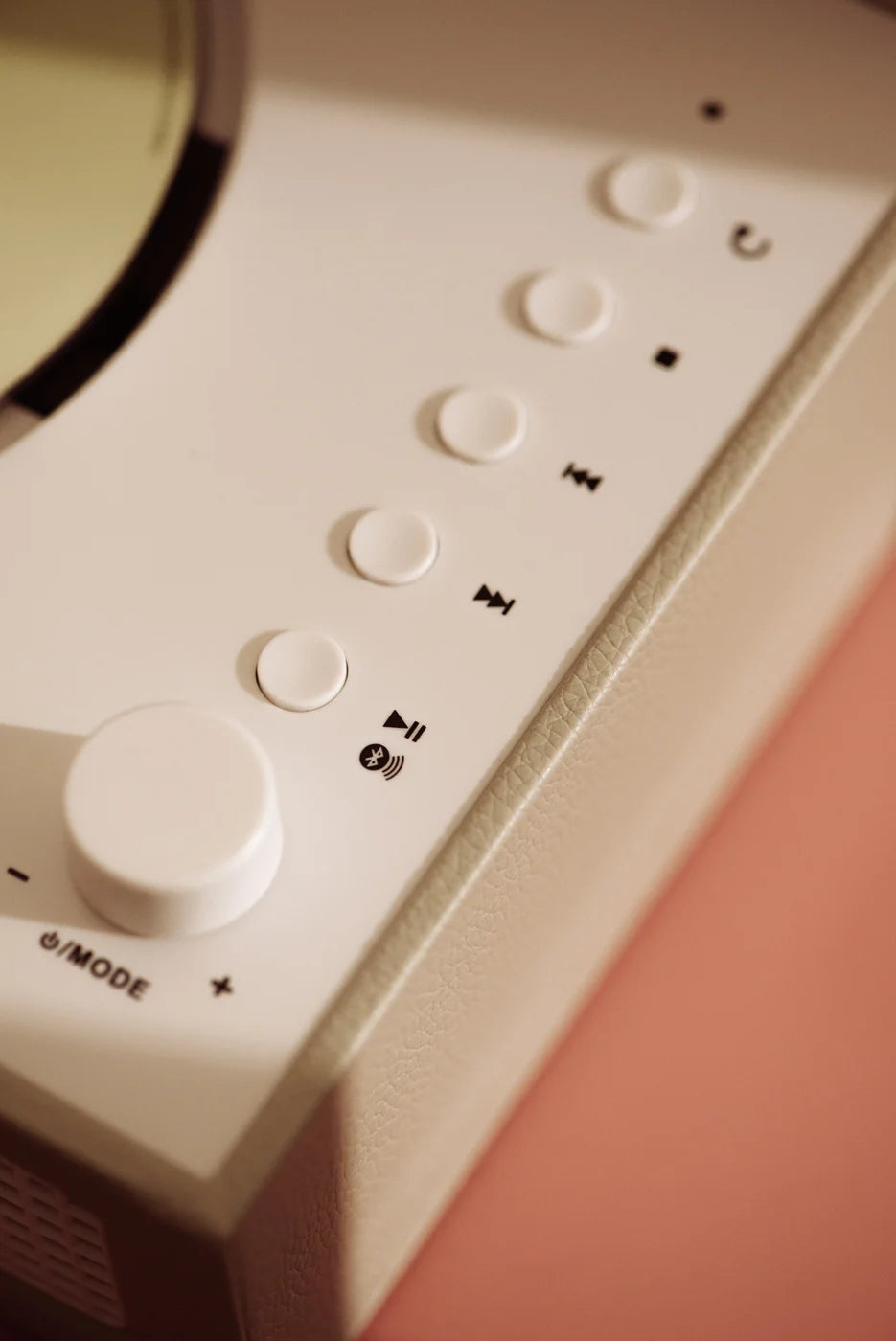 Crosley Voyager CD Player with Bluetooth and FM radio in Dune color, detail view showing speaker and control interface