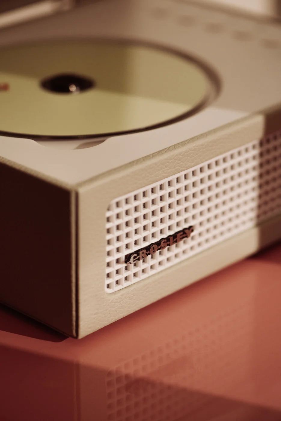 Crosley Voyager CD player in dune color, detail view showing Bluetooth and FM radio controls