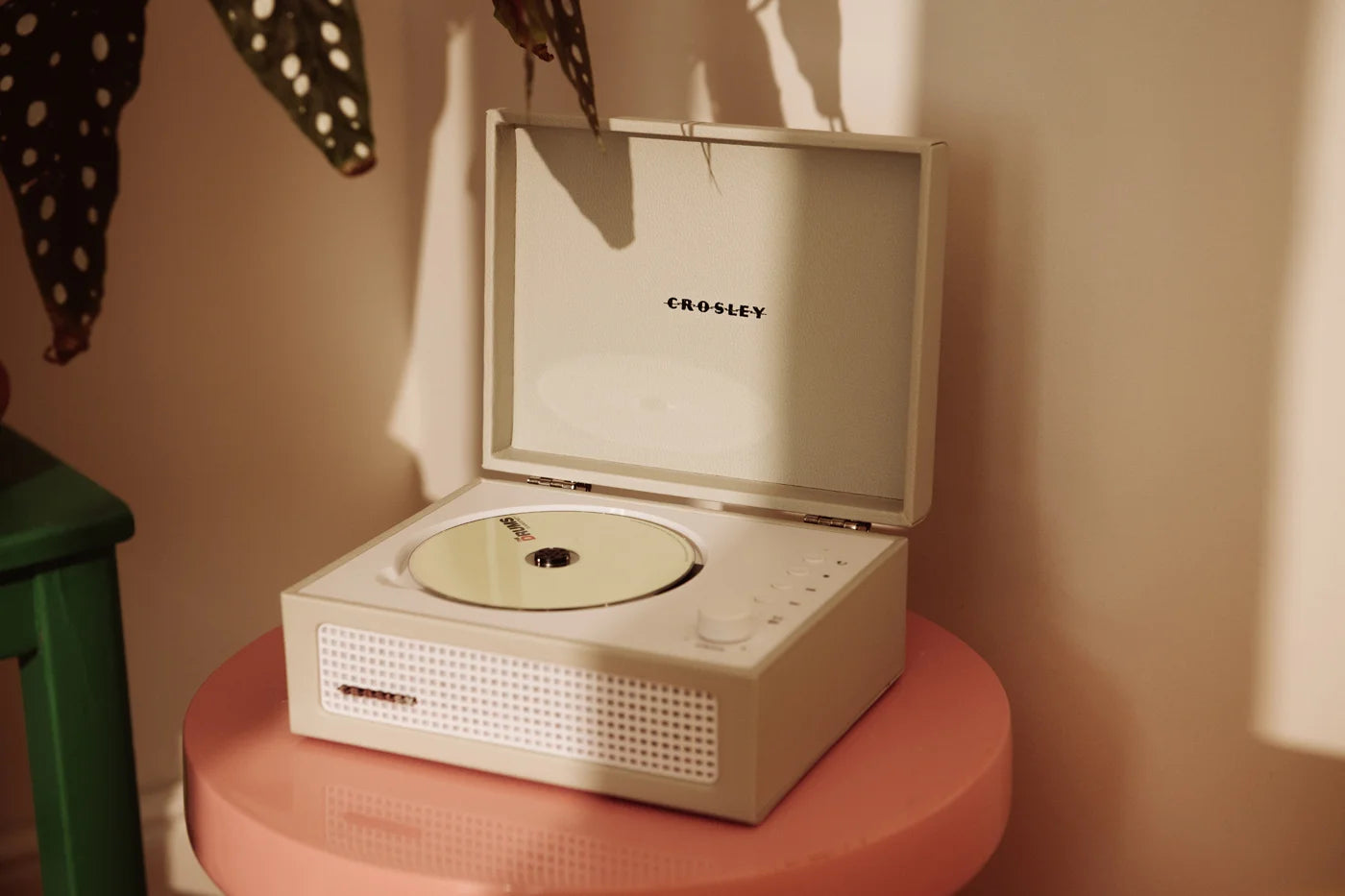 Crosley Voyager CD player with Bluetooth and FM radio in dune color displayed in lifestyle setting