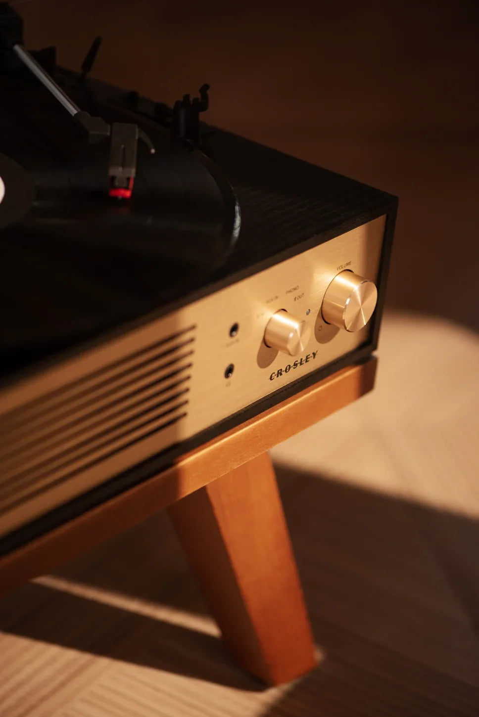 Crosley Miles Bluetooth Record Player in black, detail view of turntable controls and design