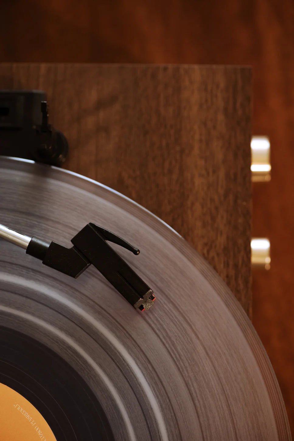 Crosley Miles Bluetooth record player in walnut finish, detail view