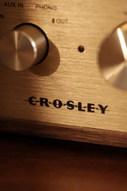Crosley Miles Bluetooth Record Player in walnut wood finish, detail view showing construction and design elements