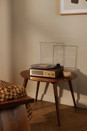 Crosley Miles Bluetooth Record Player in Walnut finish displayed in a home setting