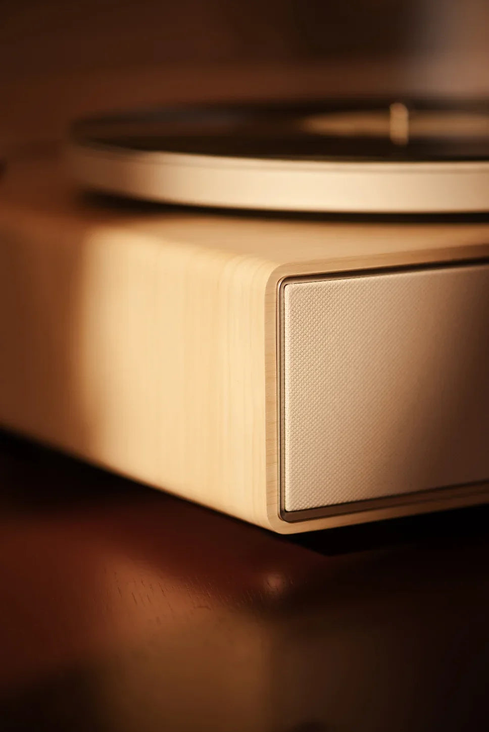 Crosley Stave Bluetooth Record Player in natural wood finish displayed in a home setting