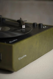 Crosley Mercury Bluetooth Vinyl Record Player in Forest Green, detailed view of turntable controls and design
