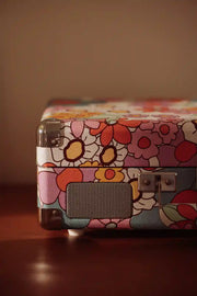 Crosley Cruiser Plus Bluetooth Record Player in floral pattern, detail view