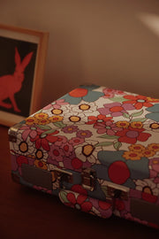 Crosley Cruiser Plus Bluetooth Record Player in floral design, showing decorative details