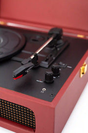 Crosley Voyager Bluetooth Record Player in burgundy, lifestye