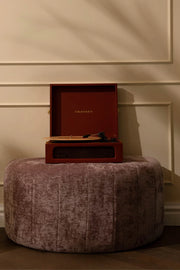 Crosley Voyager Bluetooth Record Player in burgundy, lifestye