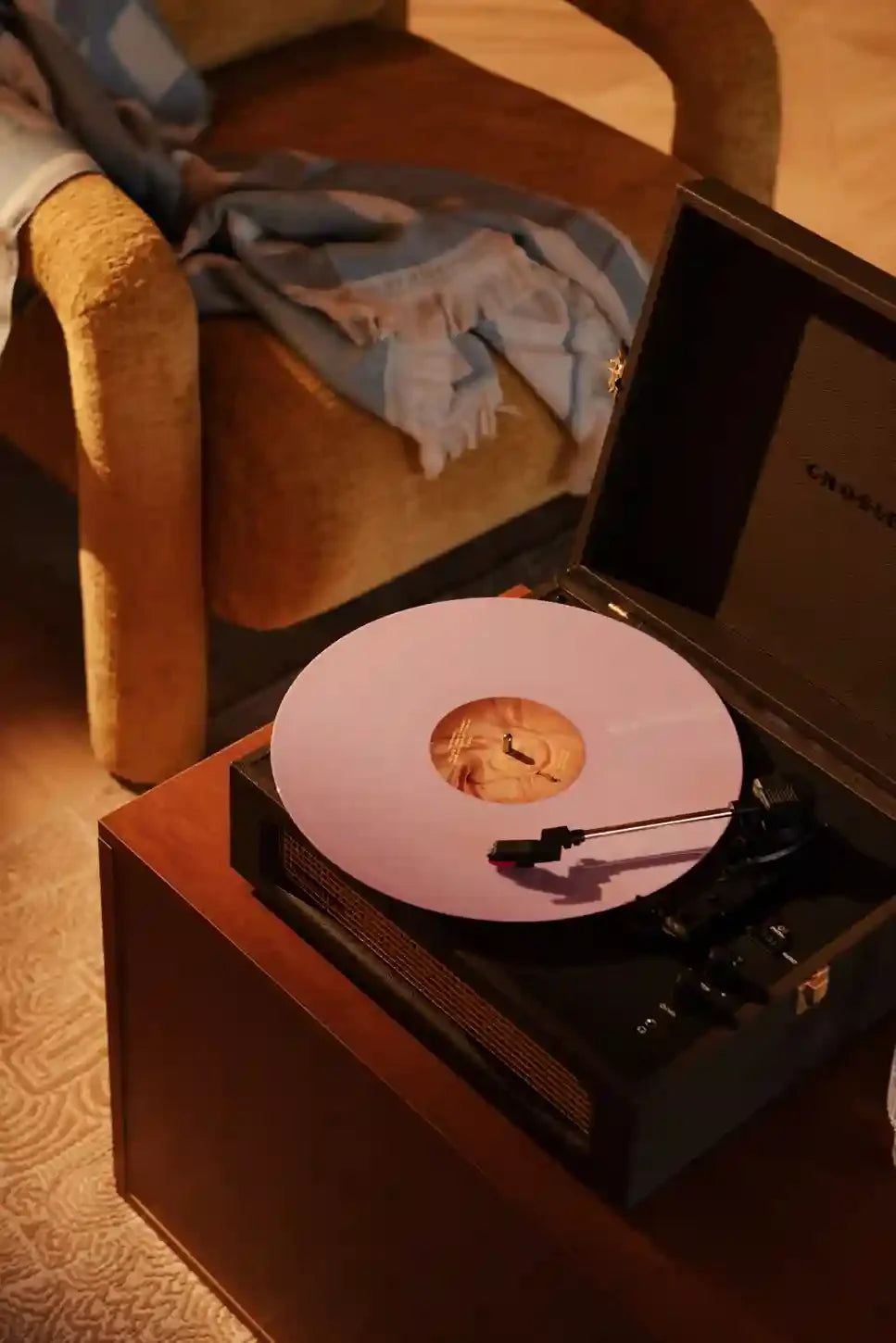Crosley Voyager Bluetooth Record Player in Cocao, displayed in a lifestyle setting