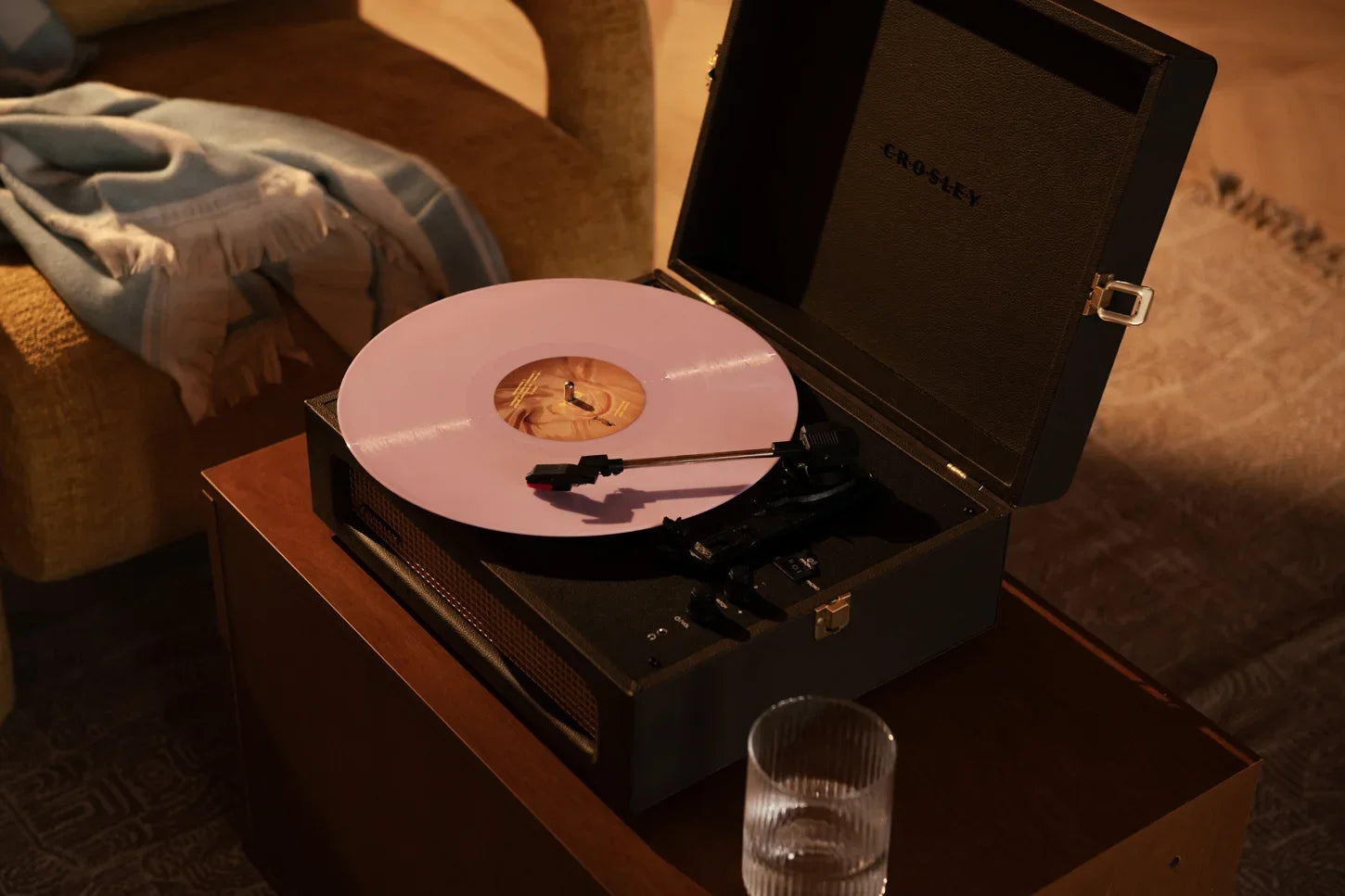 Crosley Voyager Bluetooth Record Player in Cocao, displayed in lifestyle setting
