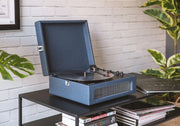 Navy Crosley Voyager Bluetooth record player displayed in lifestyle setting